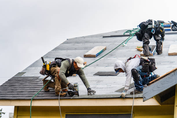 Professional Gutter Installation technician working in Webster, MA